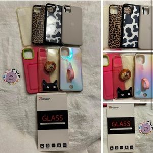 7 - iPhone 11 Pro Max phone cases, 1 - screen protector & 1 - popsocket base.